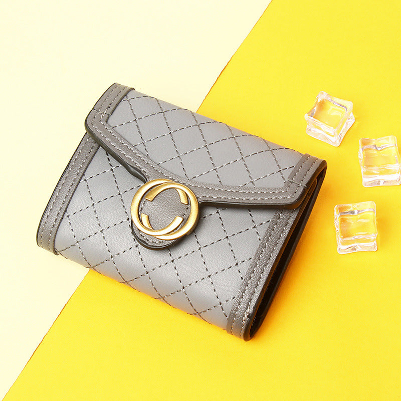 Petit portefeuille femme luxe gris