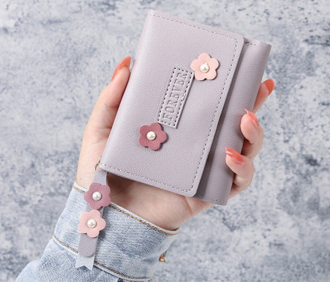 Petit portefeuille à fleurs violet