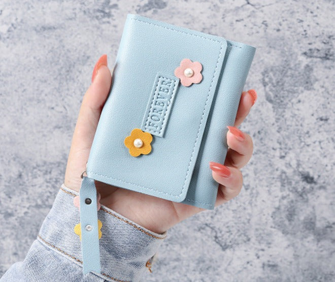 Petit portefeuille à fleurs bleu