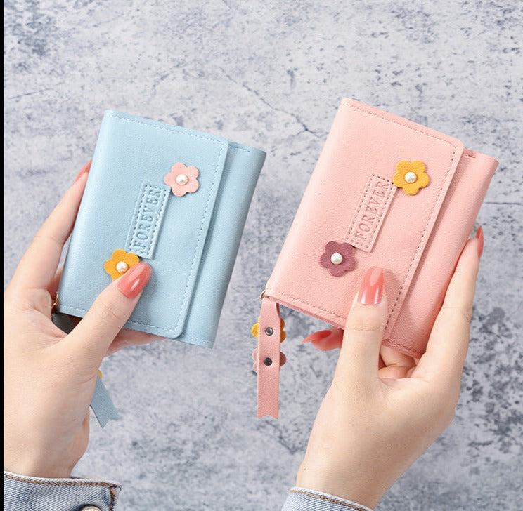 Petit portefeuille à fleurs bleu et rose