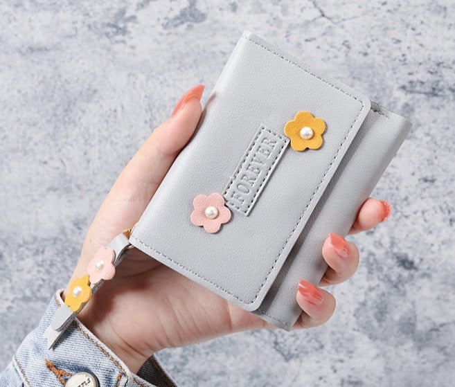 Petit portefeuille à fleurs gris
