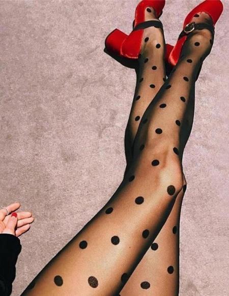 Collant noir à gros pois