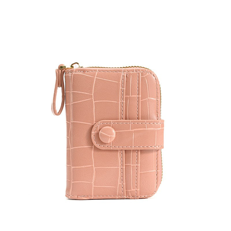 Petit portefeuille crocodile rose