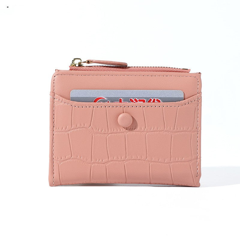 Petit portefeuille femme crocodile rose