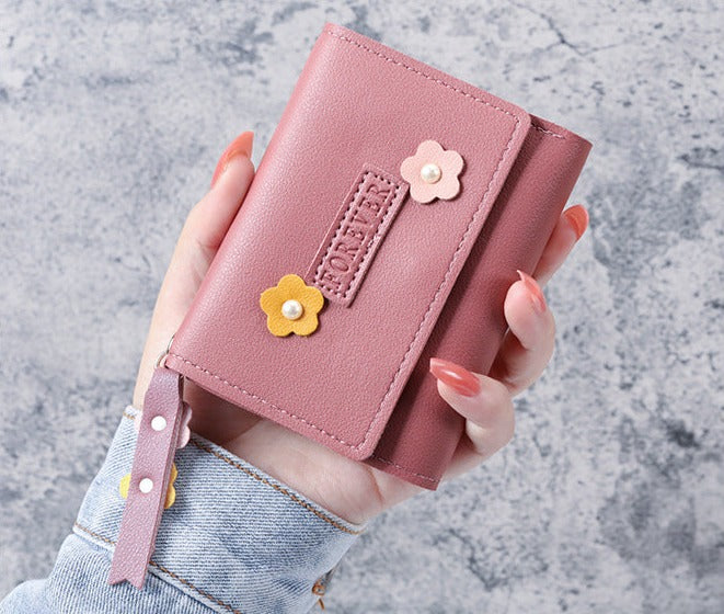 Petit portefeuille à fleurs rose