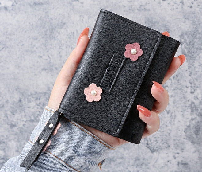 Petit portefeuille à fleurs noir