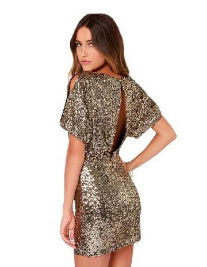 Robe dorée sequins avec ouverture dans le dos